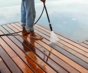 How do you ensure the safety of pedestrians during pressure cleaning?